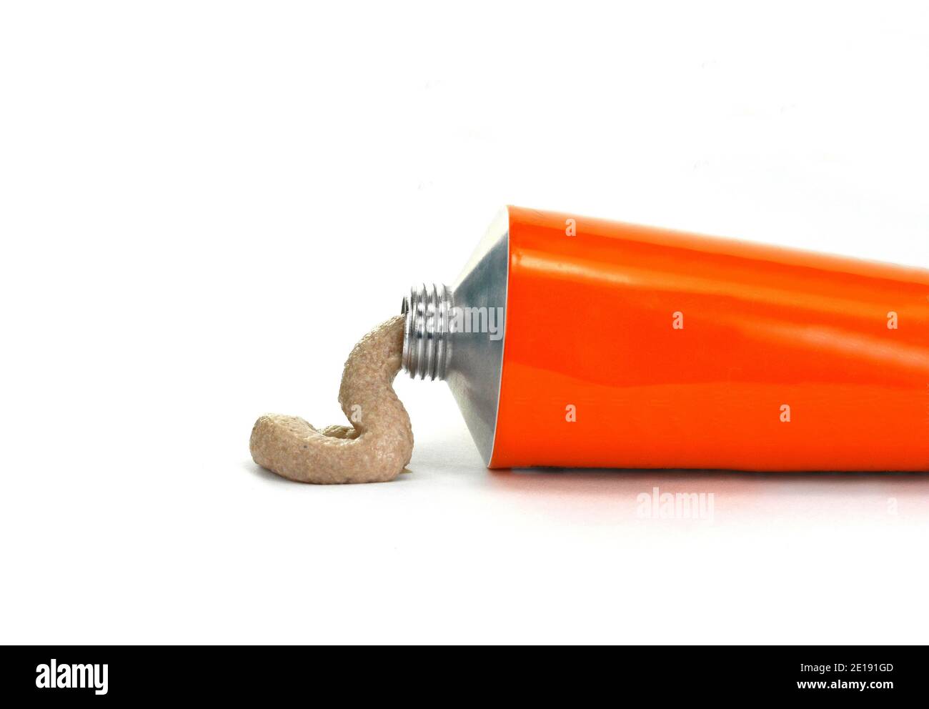 Liver pate from tube isolated on a white background. squeeze out pate