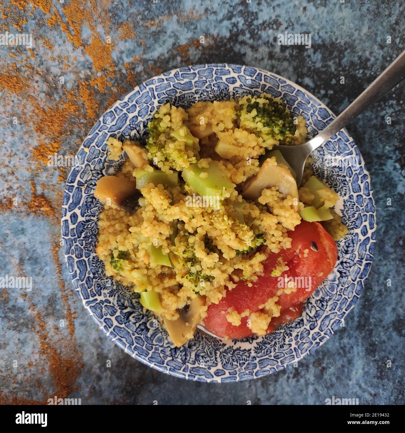 Broccoli and mushroom cous cous Stock Photo