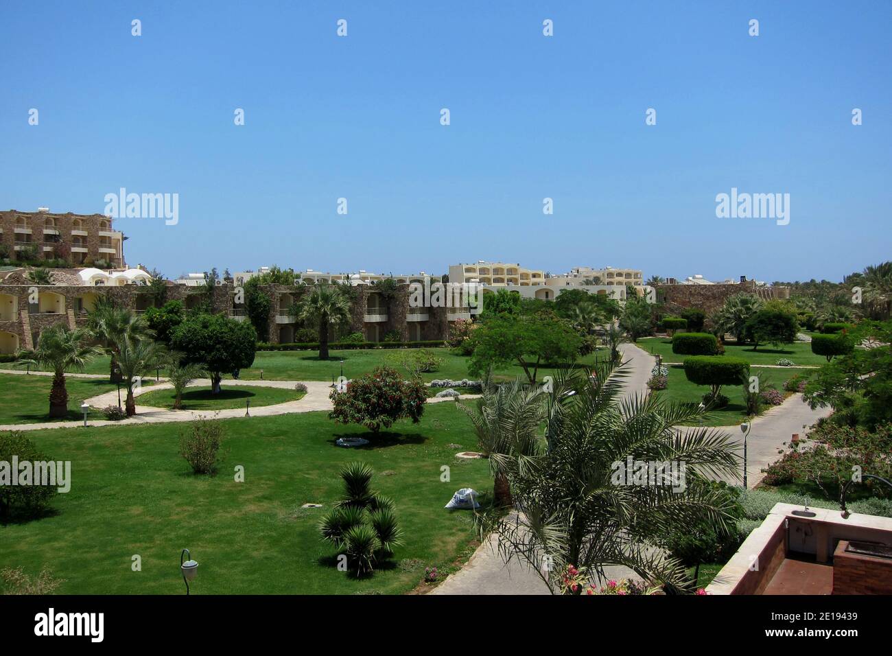 beautiful green hotel complex with many palm trees in egypt Stock Photo