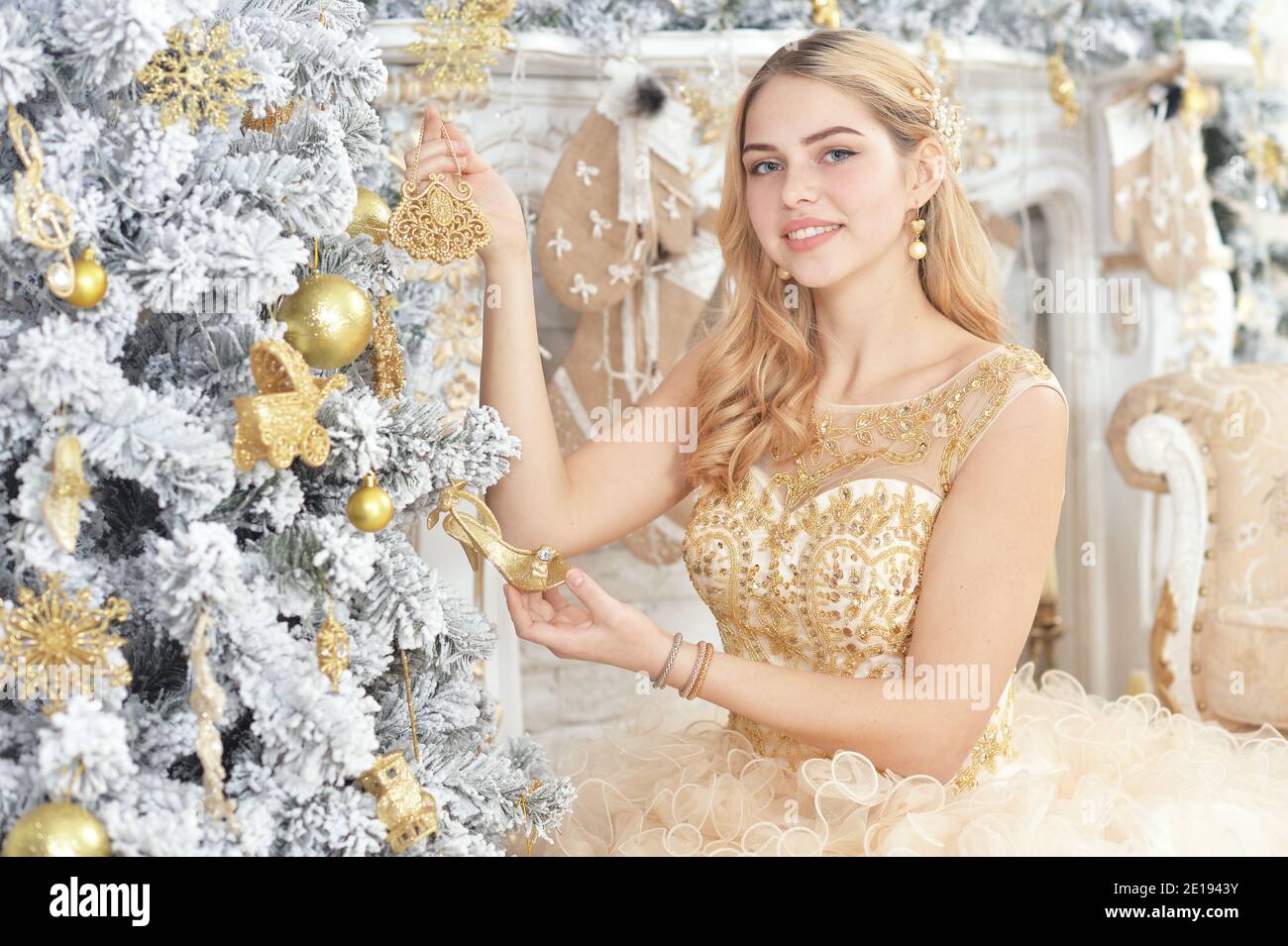 Woman decorating fireplace hi-res stock photography and images - Alamy