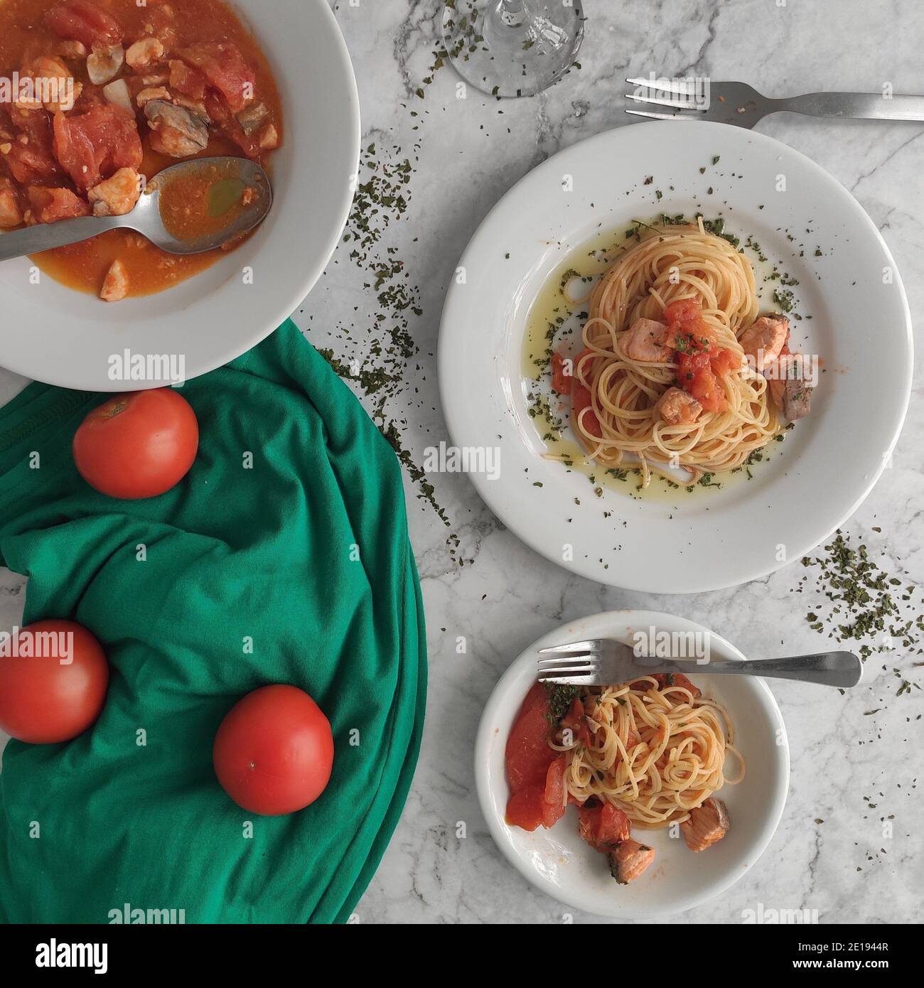 Salmon and red tomatoes spaghetti Stock Photo