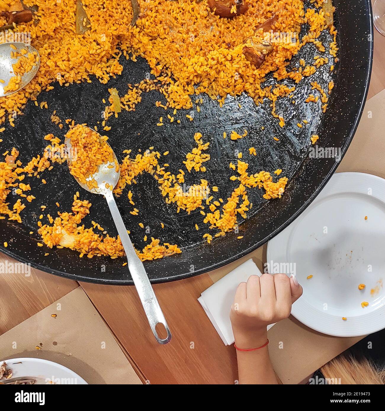 Yellow paella rice top view with a spoon Stock Photo