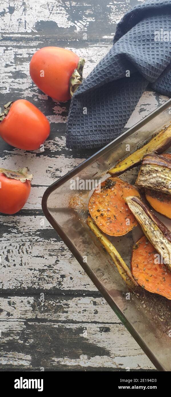 Baked vegetable in a wood table background Stock Photo