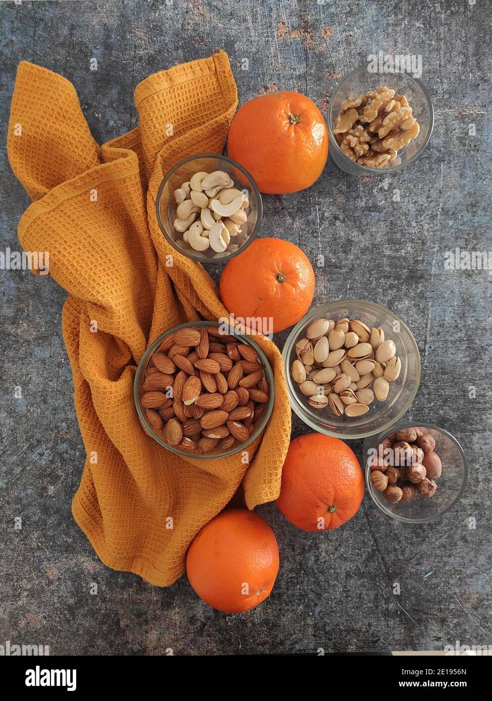 Oranges and nuts for an healthy snack Stock Photo Alamy