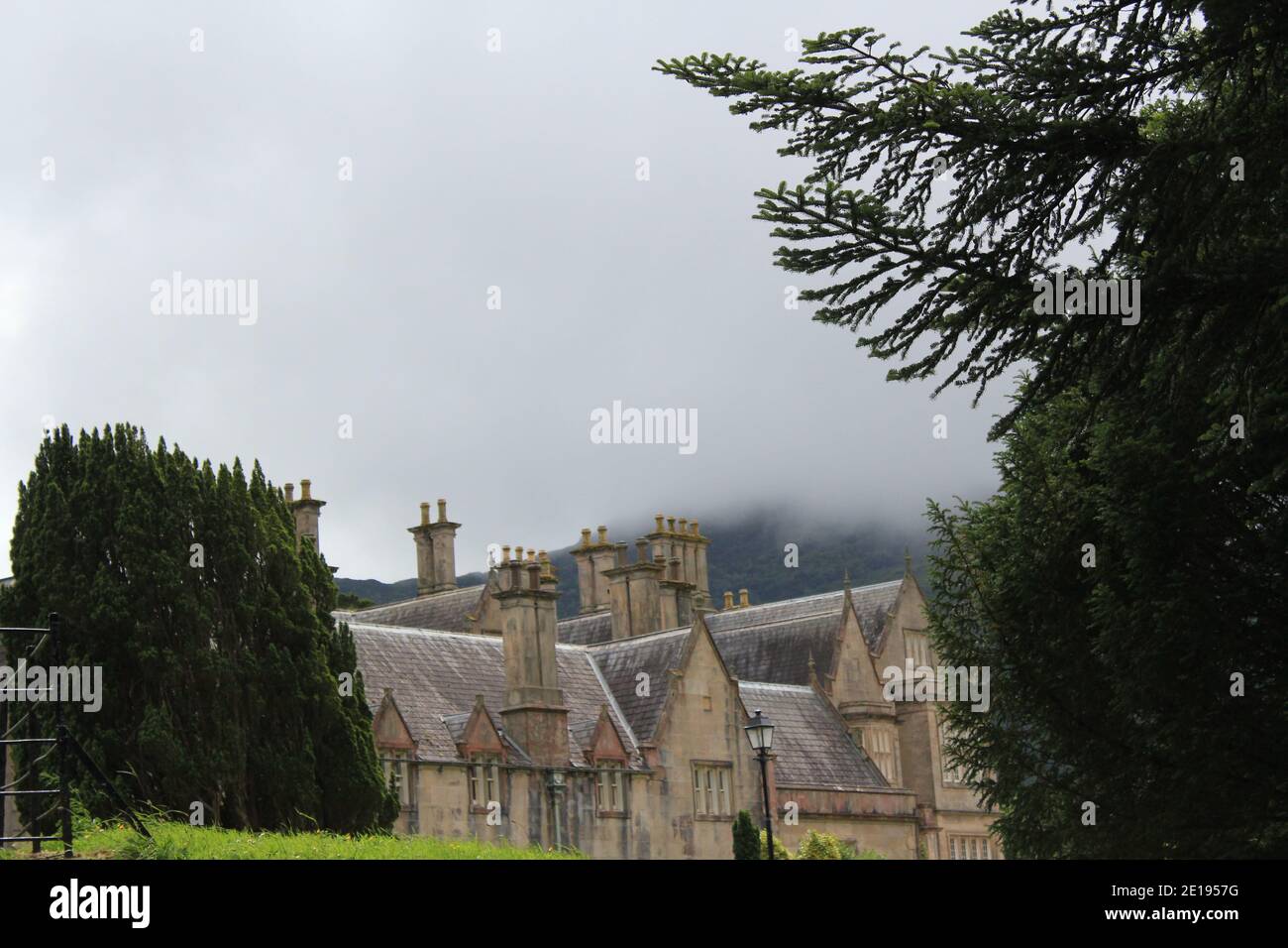 roof of an ancient irish castle under foggy sky Stock Photo