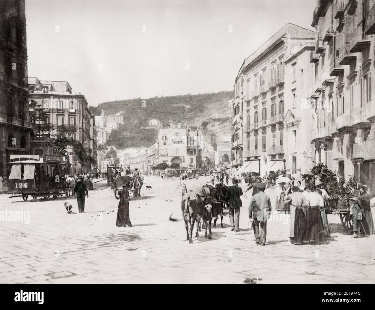 19th century vintage photograph: The Riviera di Chiaia is a long street in the Italian city of Naples, running along the coast of the Gulf of Naples. On this street there are many ancient villas built by aristocratic families between the 16th and 19th centuries, such as the Villa Pignatelli. The Chiesa di Santa Maria in Portico is nearby. Stock Photo