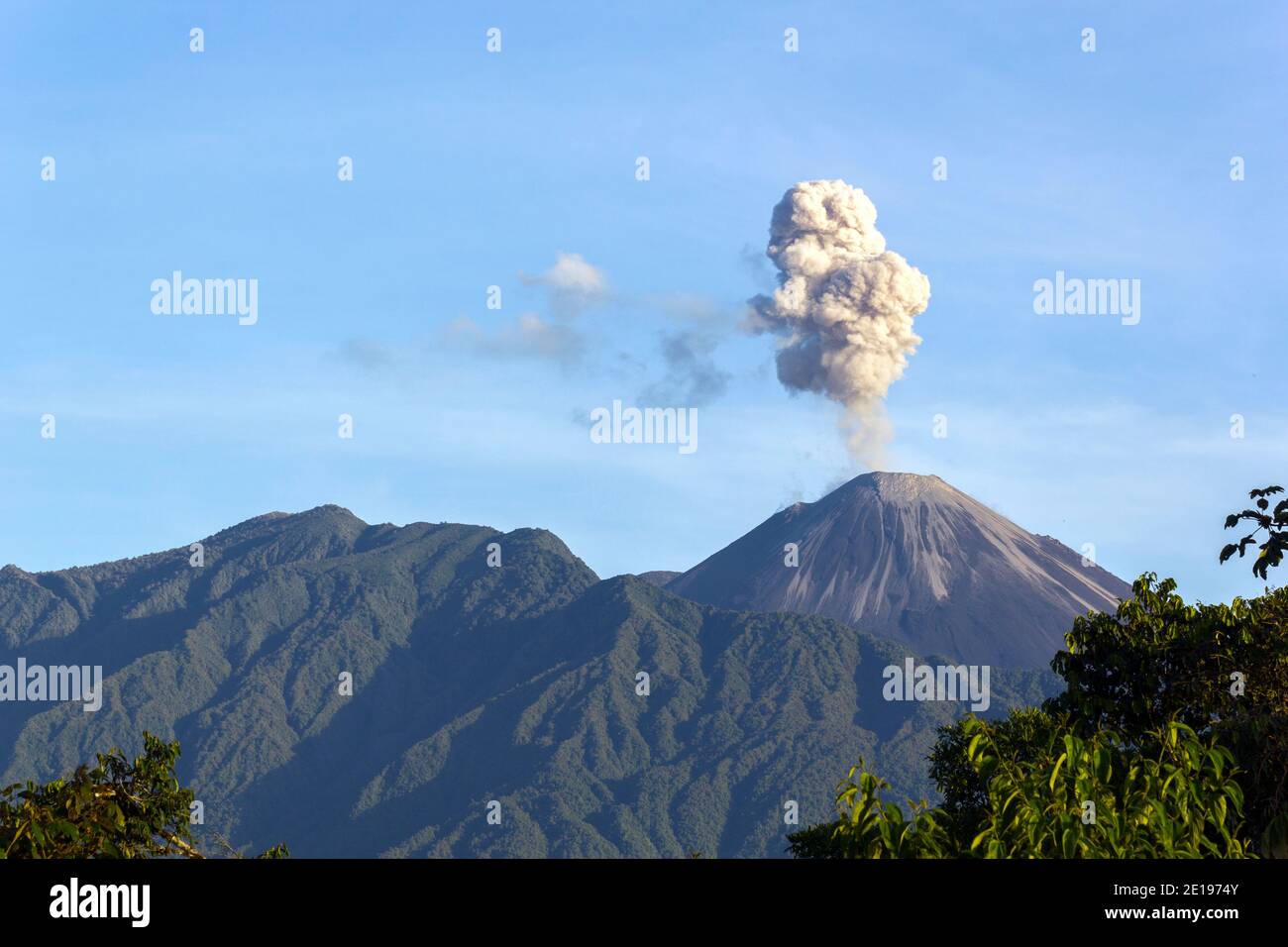 Reventador Volcano erupting, November 2015. Situated in a remote region of the Ecuadorian Amazon, Reventador has been erupting since 2002. Stock Photo