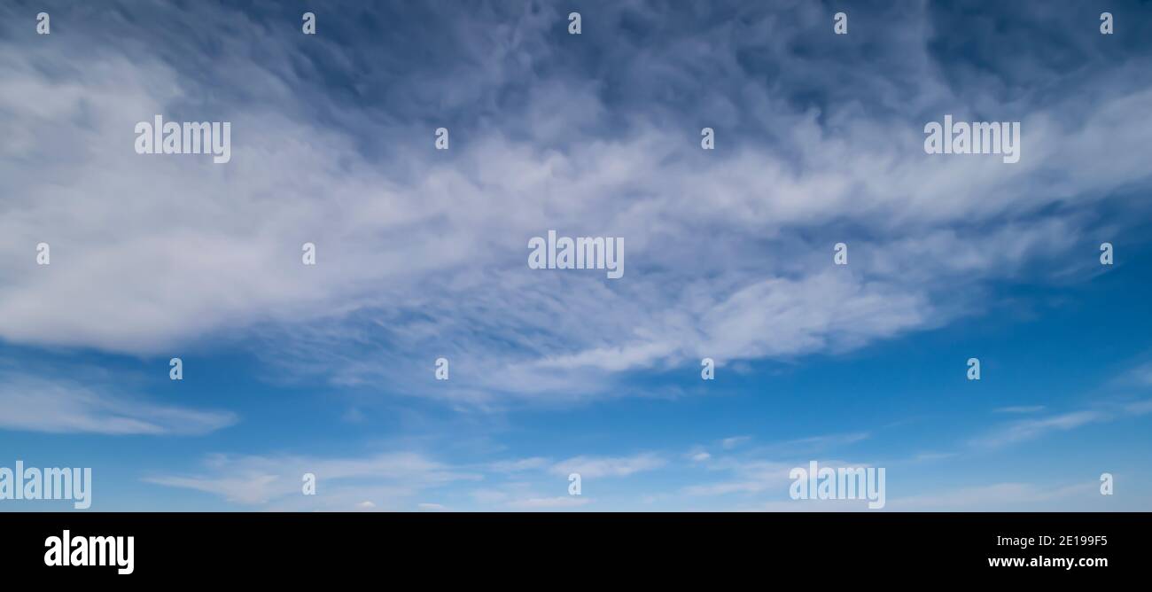 Stunning view of a blue sky with white fluffy clouds during a sunny day ...
