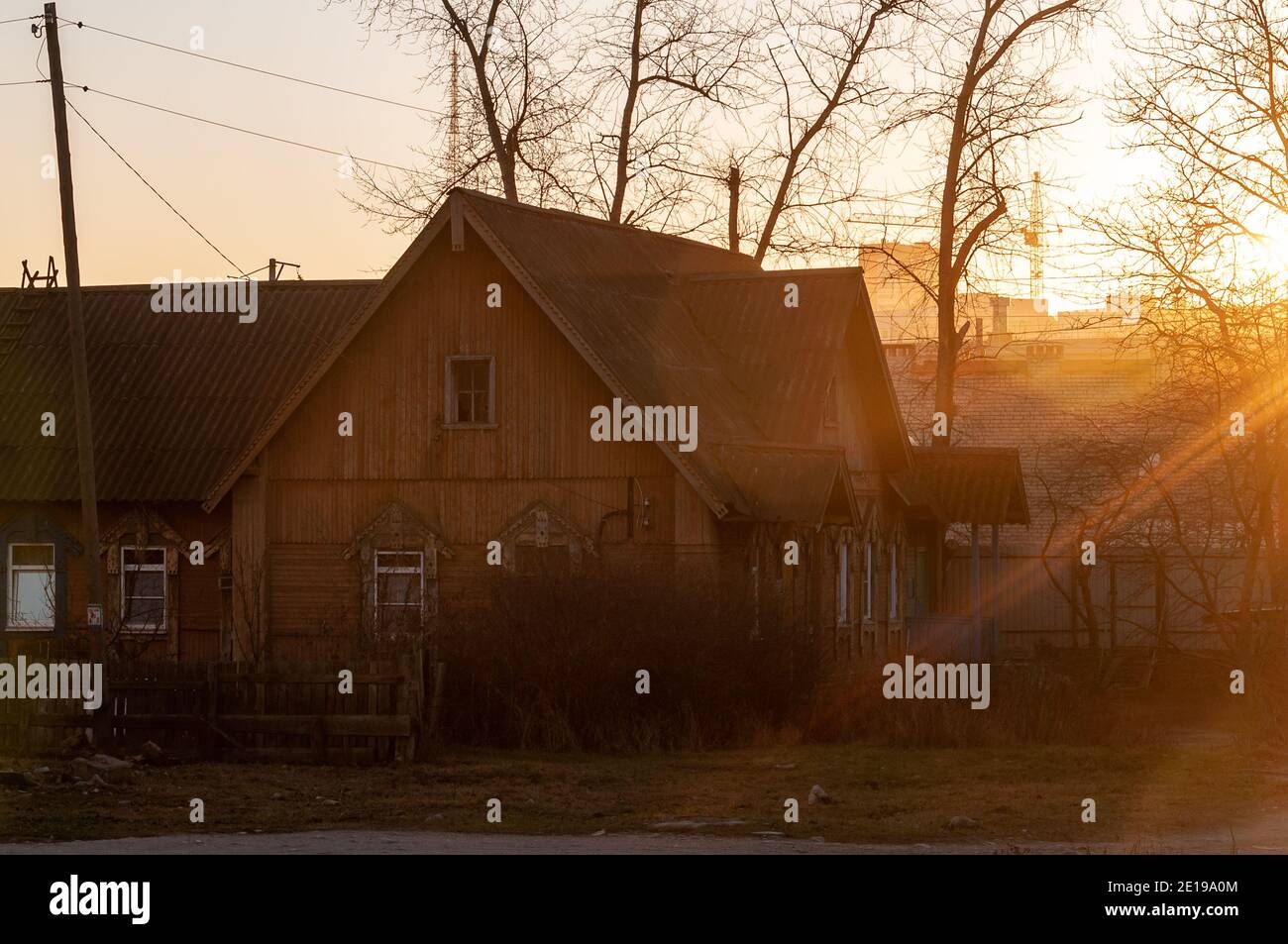 old wooden house in late autumn in the rays of the setting sun Stock ...