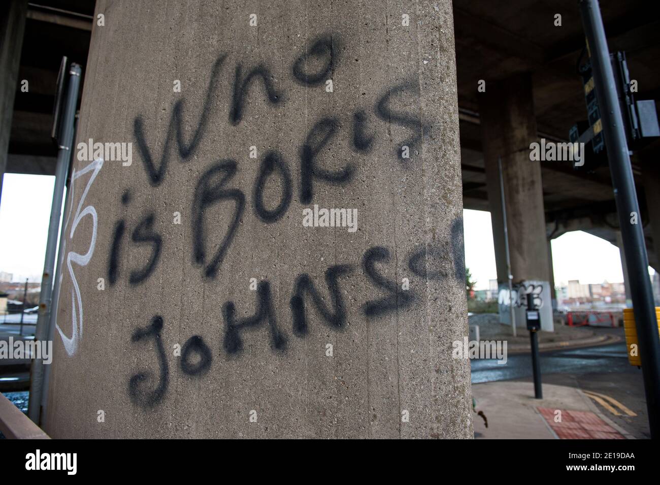 Glasgow, Scotland, UK. 5th Jan, 2021. Pictured: Either somebody has been living in a cave for a while or they are trying to make a point, their graffiti on the Kingston Bridge, “WHO IS Boris Johnson”. As of 00:01 this morning Scotland has been placed into another lockdown as per the Scottish First Minister's address at 2pm yesterday. Only essential travel is allowed such as going to work and essential food shopping and exercise, other than that everyone must stay in their homes. Credit: Colin Fisher/Alamy Live News Stock Photo