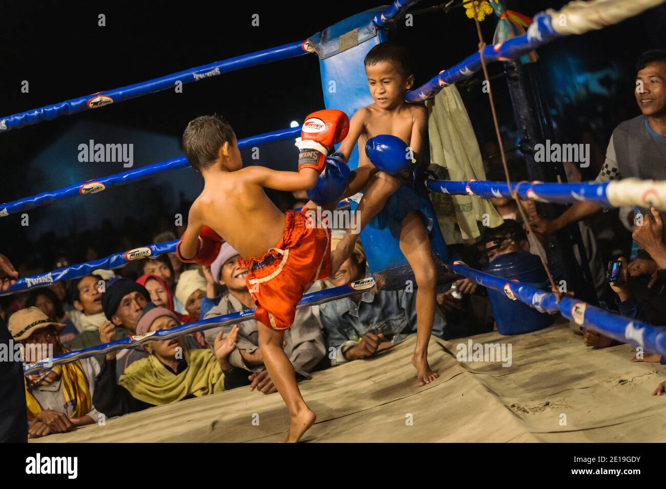 Children Thai boxing fight. Muay Thai (Thai boxing) is the national sport of Thailand. Stock Photo