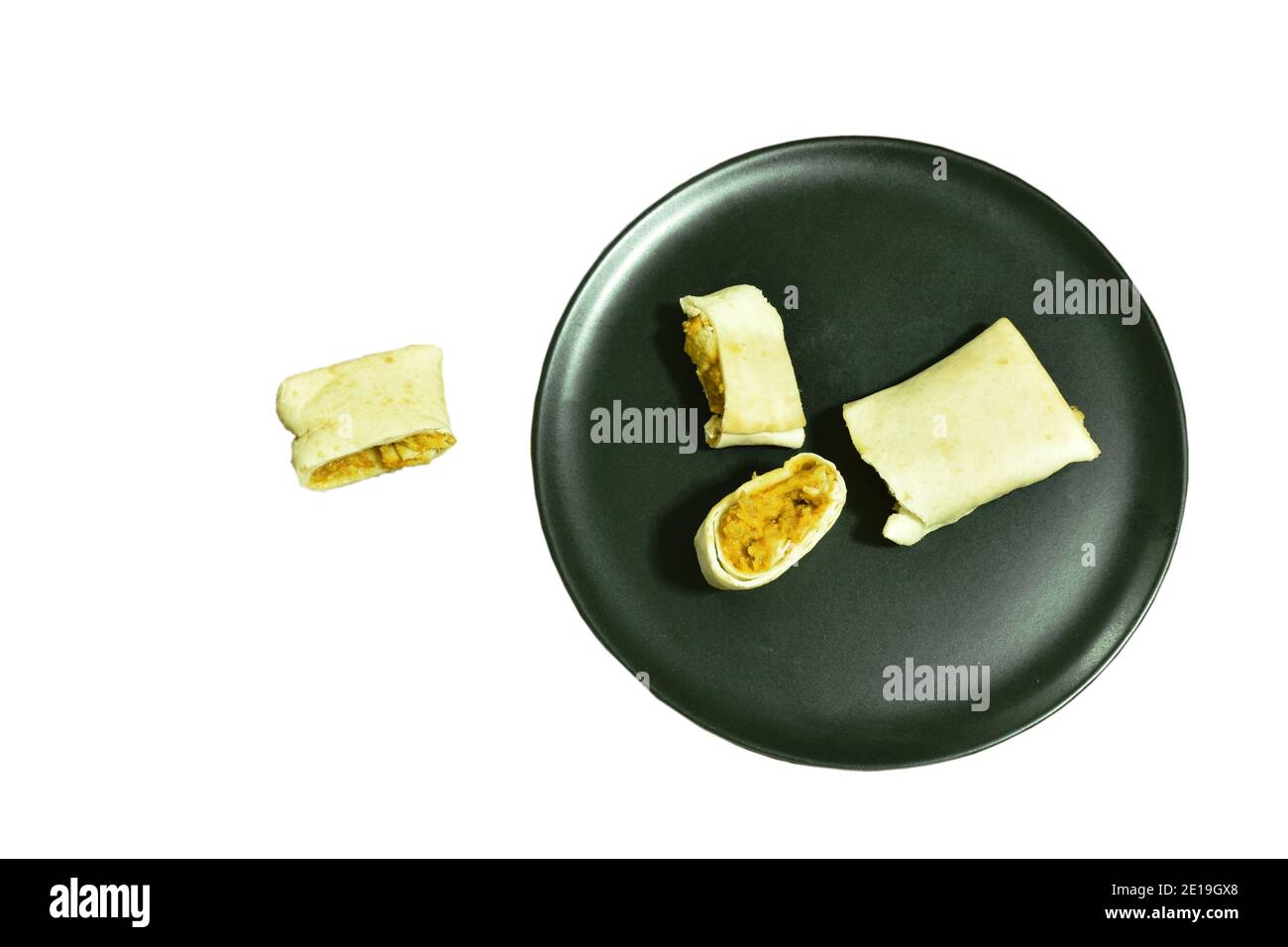 roti stuffed chicken curry sauce roll on plate Stock Photo - Alamy