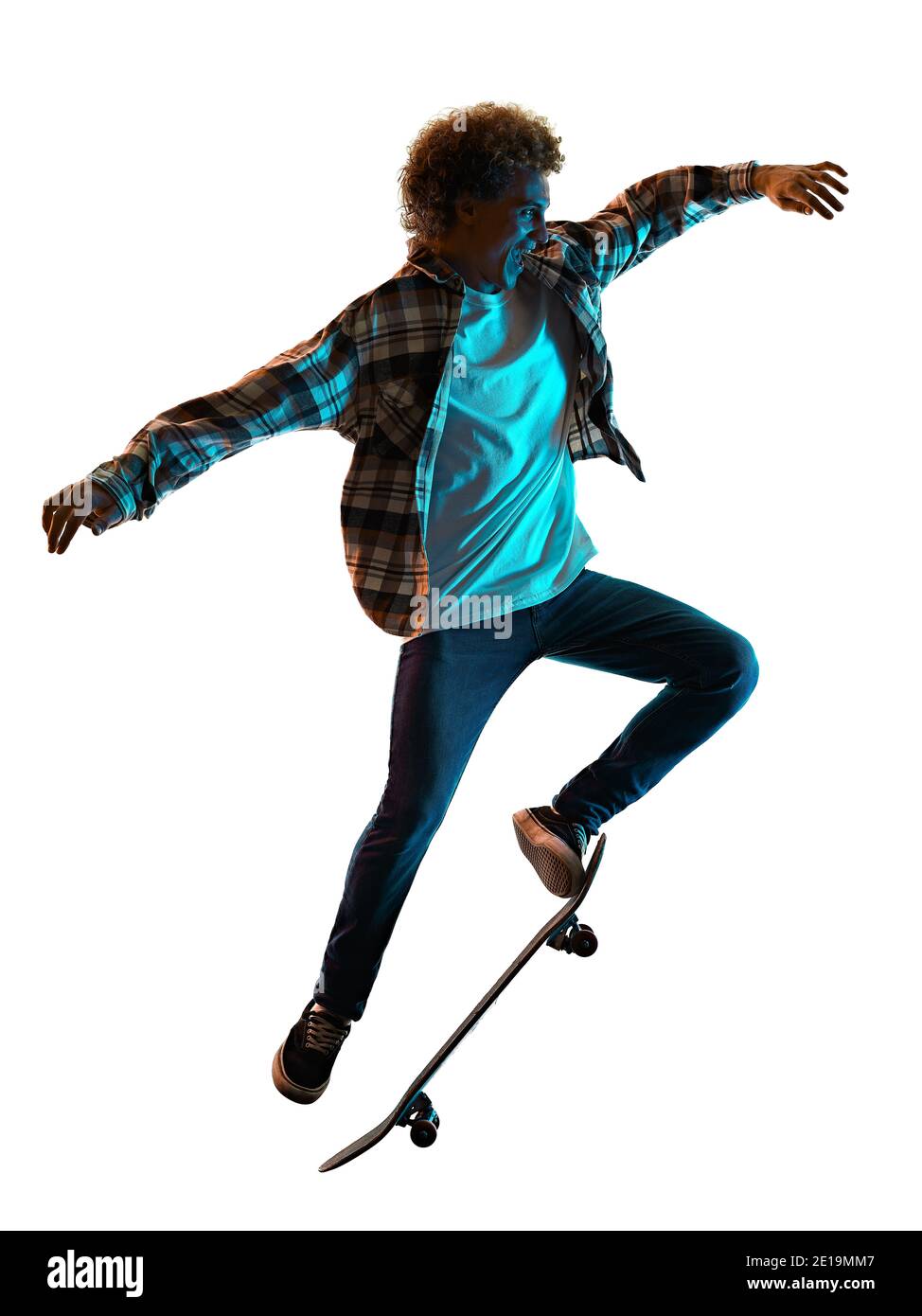 one caucasian young man skateboarder Skateboarding in studio silhouette shadow  isolated on white background Stock Photo