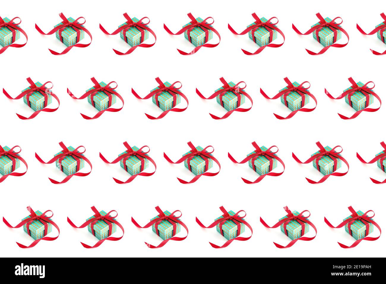 Seamless pattern. A green gift box with a red ribbon and a bow on a ...