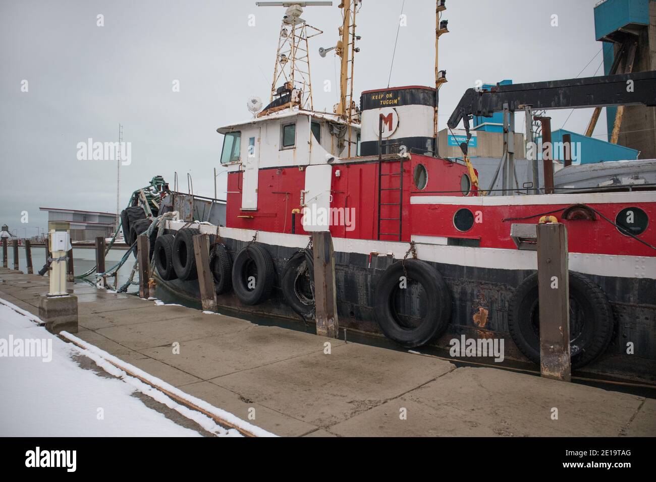 Tugboats moored to the dock. Stock Photo