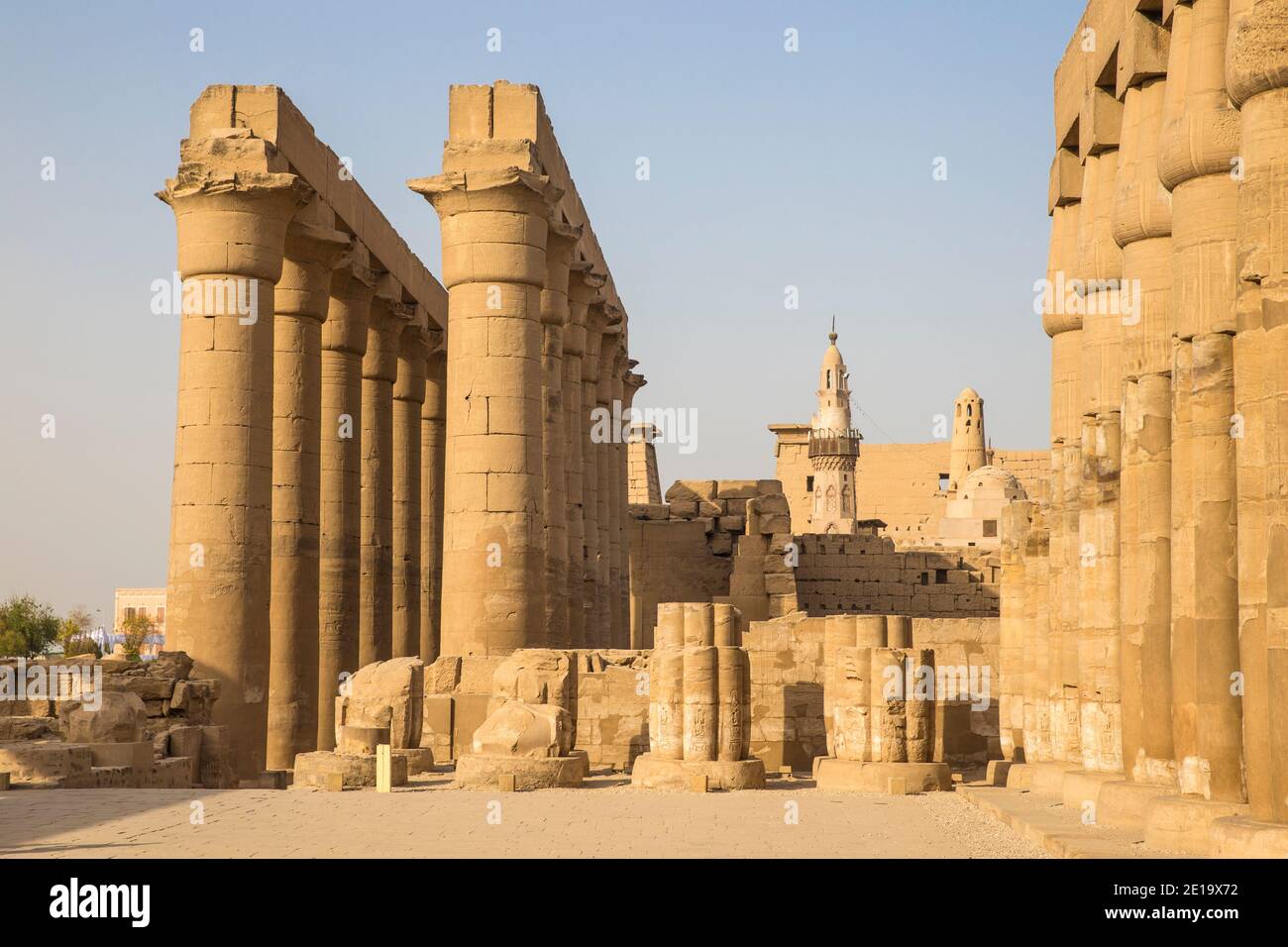 Egypt, Luxor, Luxor Temple, the Great colonnade of Amenophis 11, and to the right The ancient mosque of Abu Al Haggag Stock Photo