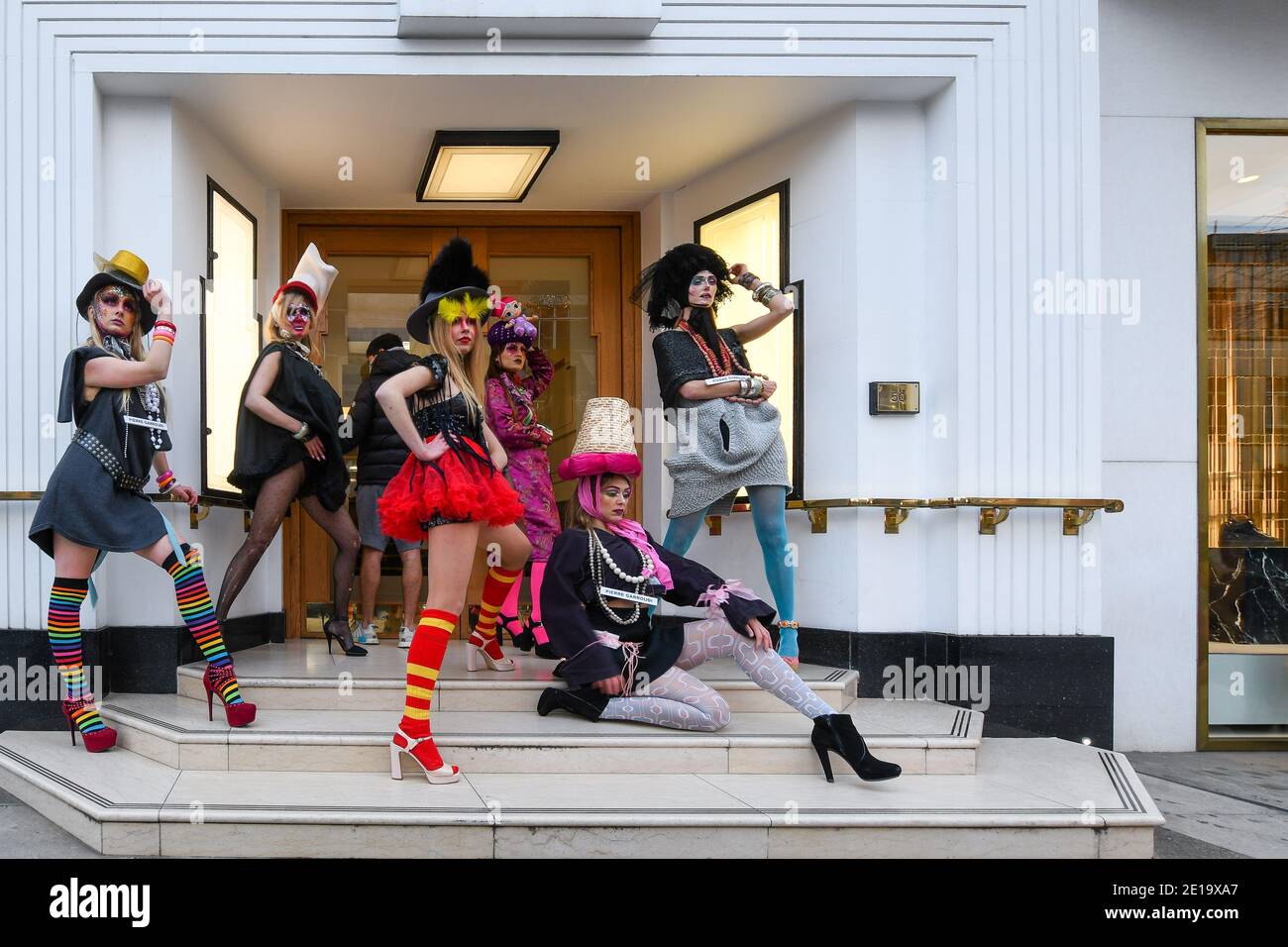Flamboyant fashion designer Pierre Garroudi held his flashmob in London taking place from Knightsbridge to Sloan Square in December. Pierre showcases his designs and crisscrosses central London with a different location and designs each week. Merging art with fashion his designs have been worn by some of the famous style icons from Naomi Campbell to Scarlet Johansson. Strking makeup is used from the makeup artists @makeup_and_beauty_jo @hair_makeup_by_jacy and @zee_makeup_hair @imperialartistryunlimited Models used were @_ericabishop @erinlxoxo @elina.popescu @siborafisniku1 @merilintoomra Stock Photo
