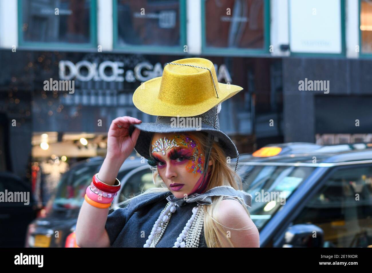 Flamboyant fashion designer Pierre Garroudi held his flashmob in London taking place from Knightsbridge to Sloan Square in December. Pierre showcases his designs and crisscrosses central London with a different location and designs each week. Merging art with fashion his designs have been worn by some of the famous style icons from Naomi Campbell to Scarlet Johansson. Strking makeup is used from the makeup artists @makeup_and_beauty_jo @hair_makeup_by_jacy and @zee_makeup_hair @imperialartistryunlimited Models used were @_ericabishop @erinlxoxo @elina.popescu @siborafisniku1 @merilintoomra Stock Photo