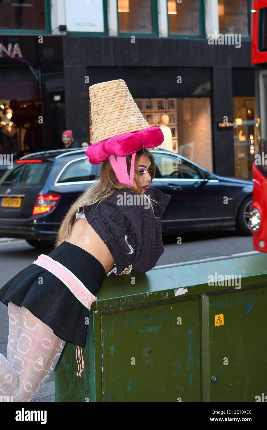 Flamboyant fashion designer Pierre Garroudi held his flashmob in London taking place from Knightsbridge to Sloan Square in December. Pierre showcases his designs and crisscrosses central London with a different location and designs each week. Merging art with fashion his designs have been worn by some of the famous style icons from Naomi Campbell to Scarlet Johansson. Strking makeup is used from the makeup artists @makeup_and_beauty_jo @hair_makeup_by_jacy and @zee_makeup_hair @imperialartistryunlimited Models used were @_ericabishop @erinlxoxo @elina.popescu @siborafisniku1 @merilintoomra Stock Photo