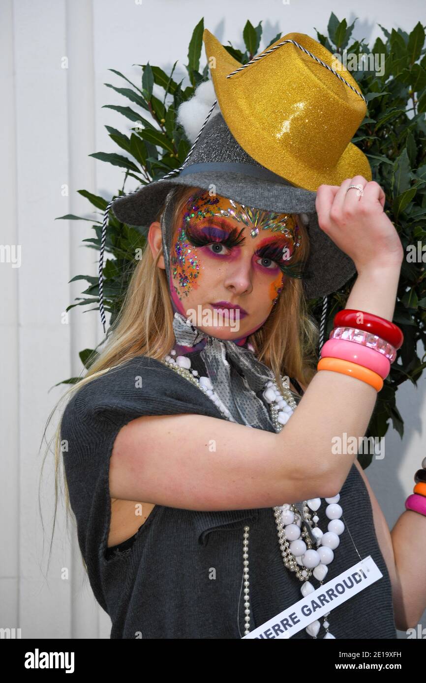 Flamboyant fashion designer Pierre Garroudi held his flashmob in London taking place from Knightsbridge to Sloan Square in December. Pierre showcases his designs and crisscrosses central London with a different location and designs each week. Merging art with fashion his designs have been worn by some of the famous style icons from Naomi Campbell to Scarlet Johansson. Strking makeup is used from the makeup artists @makeup_and_beauty_jo @hair_makeup_by_jacy and @zee_makeup_hair @imperialartistryunlimited Models used were @_ericabishop @erinlxoxo @elina.popescu @siborafisniku1 @merilintoomra Stock Photo