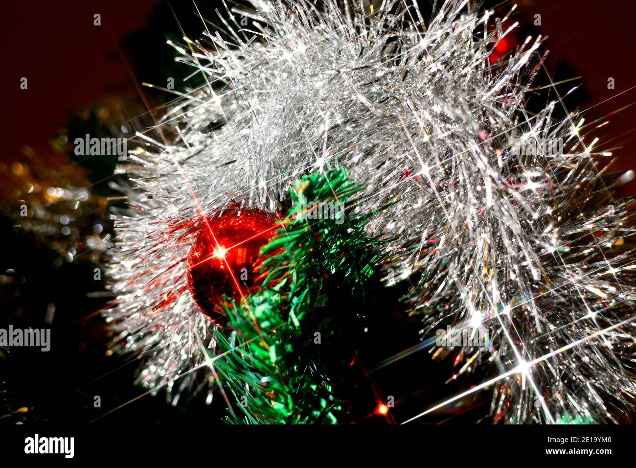 Christmas tree with red ball and lights Stock Photo - Alamy