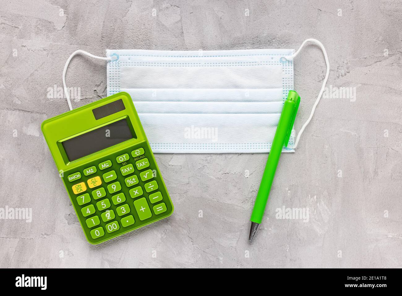 Face mask, calculator, pen. Tax return concept Stock Photo Alamy