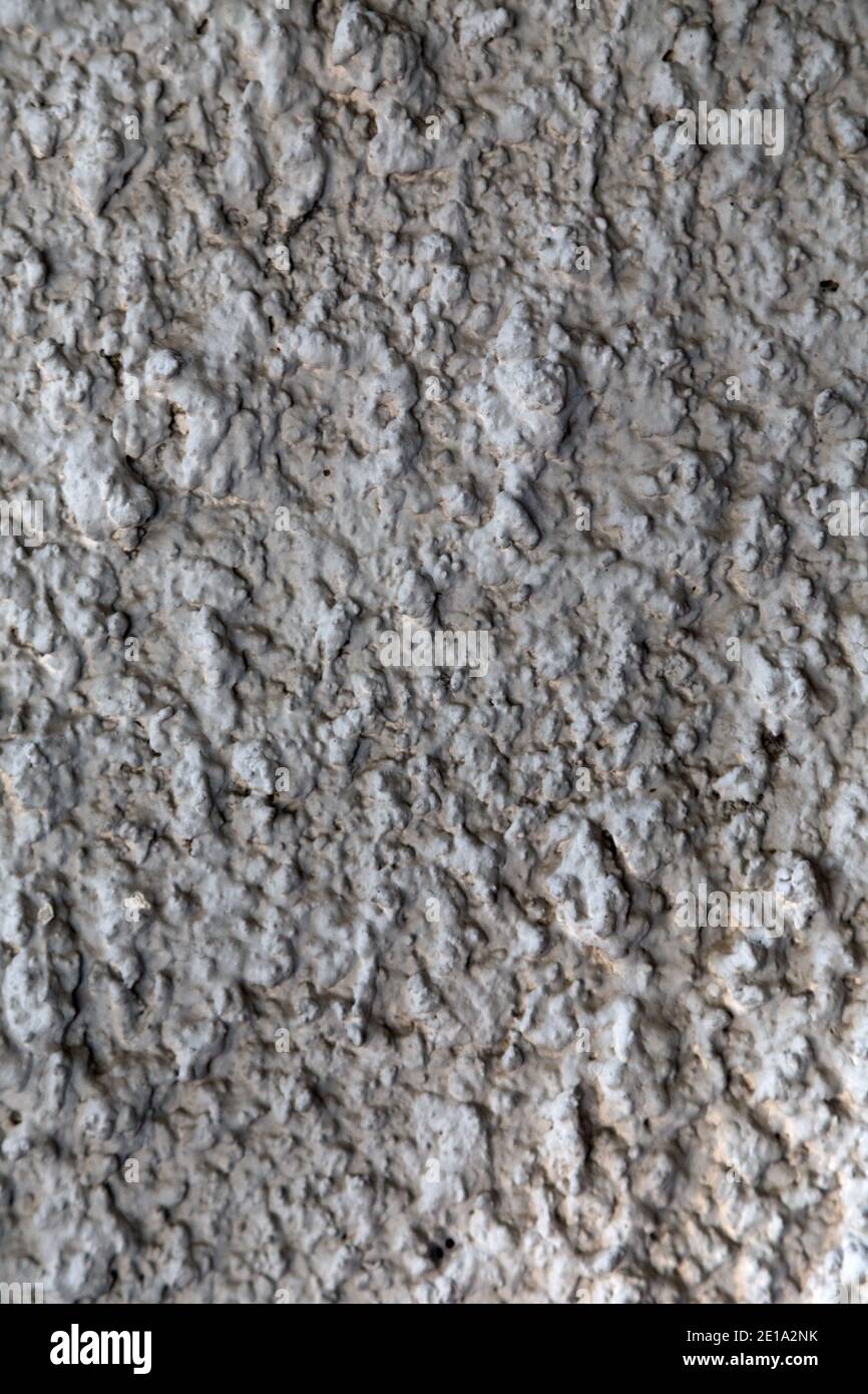 Covering a wall with cement ortar by throwing it. Close-up. This image may be used as a background. Stock Photo