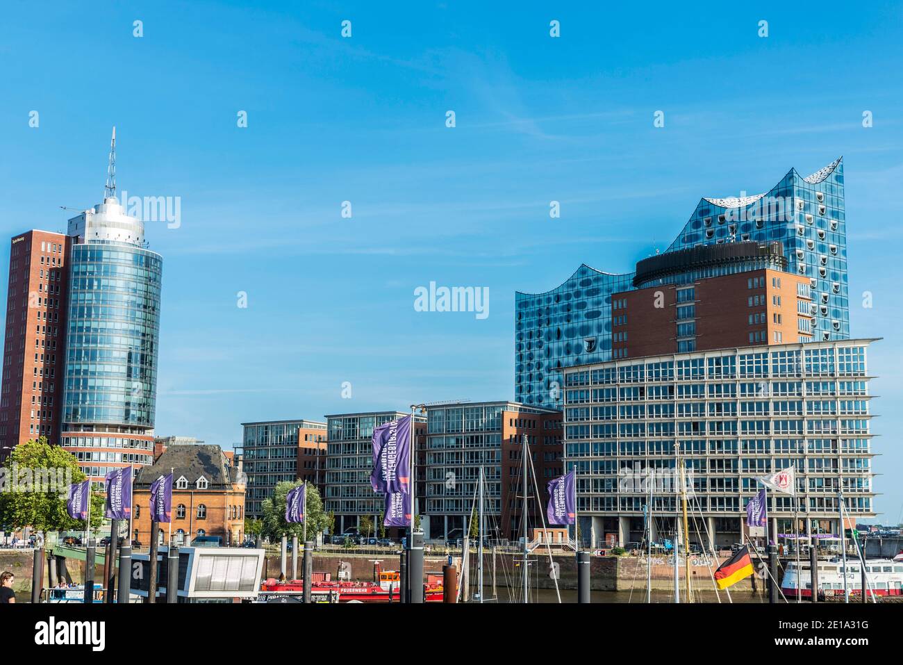 Hamburg, Germany - August 22, 2019: View of the Hanseatic Trade Center (HTC), Columbus Haus and the Elbphilharmonie (Elbe Philharmonic Hall) in HafenC Stock Photo