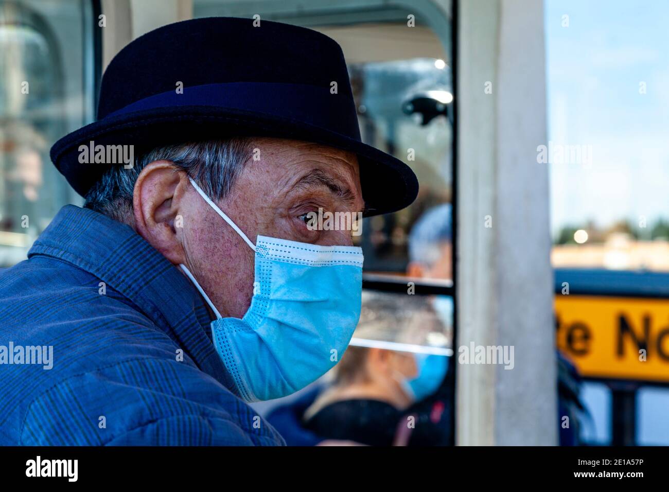 Elderly person wearing a mask hi-res stock photography and images - Alamy