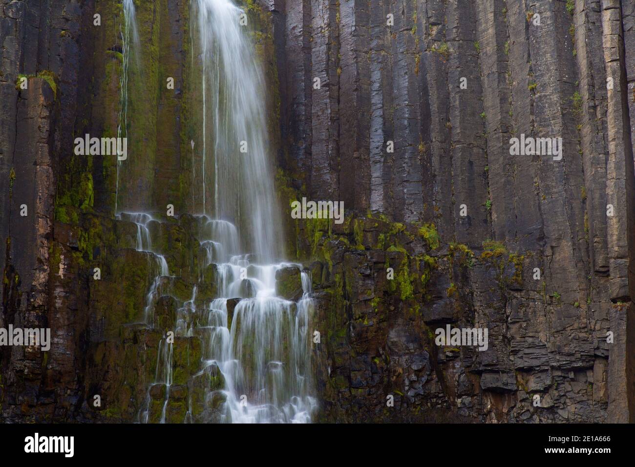 Basalt columns and Stuðlafoss / Studlafoss, waterfall at Studlagil / Stuðlagil Canyon, Jökuldalur / Glacier Valley, Austurland, Iceland Stock Photo