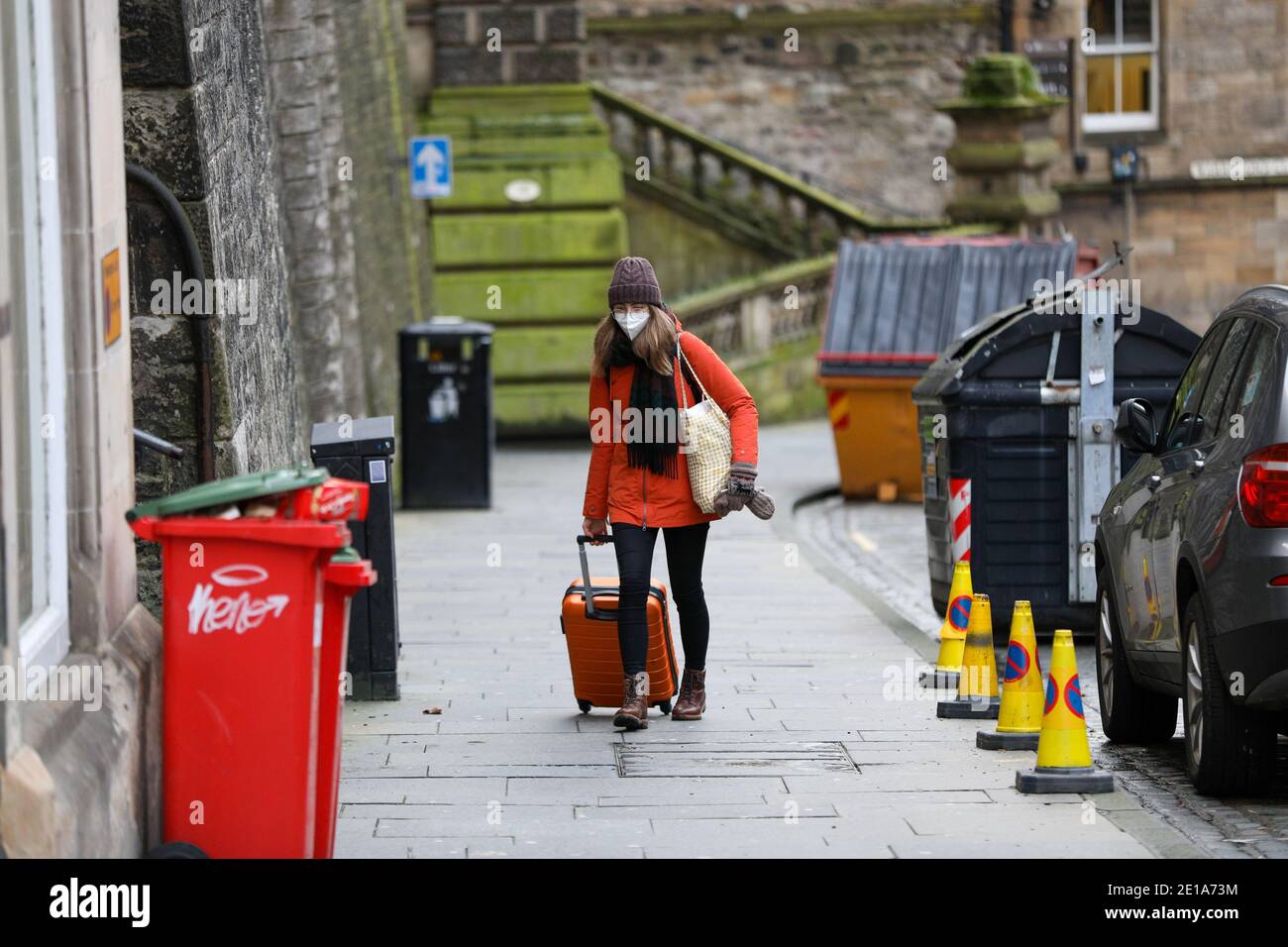 Edinburgh, Scotland, UK. 05th Jan, 2021. One passenger with luggage who arrived on mostly empty trains at Edinburgh Waverley Credit: David Coulson/Alamy Live News Stock Photo