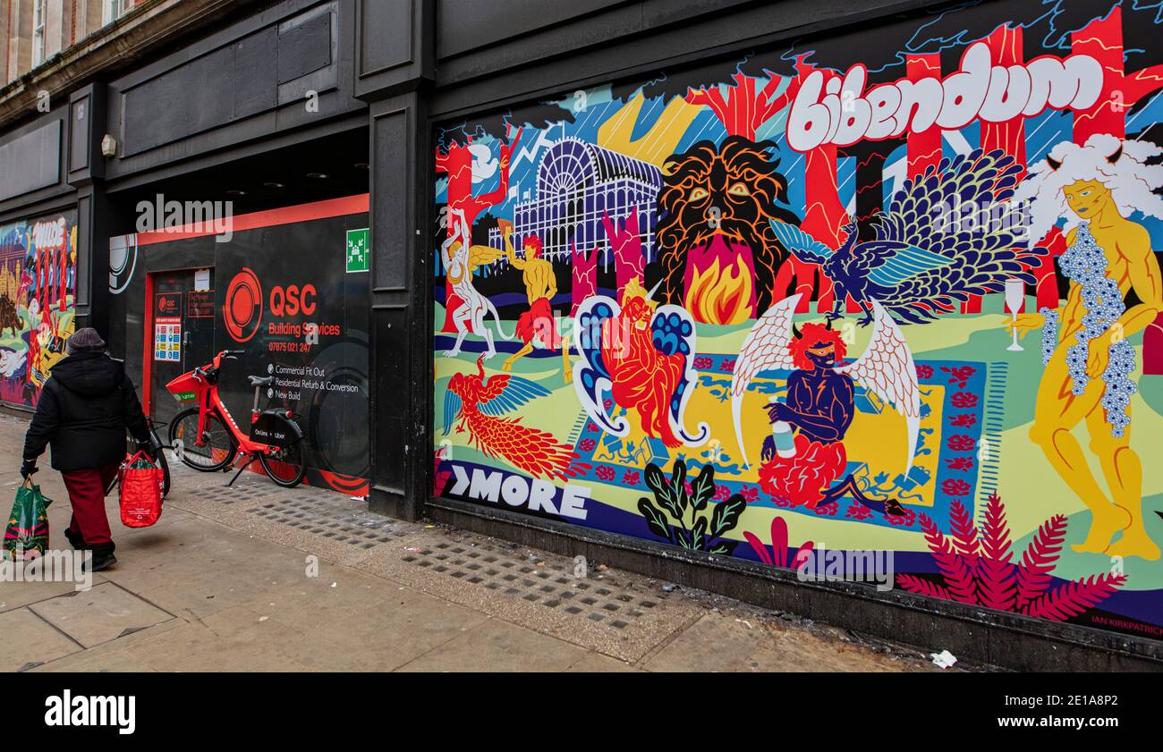 Shopfront in Kensington High Street, London, painted over with brightly