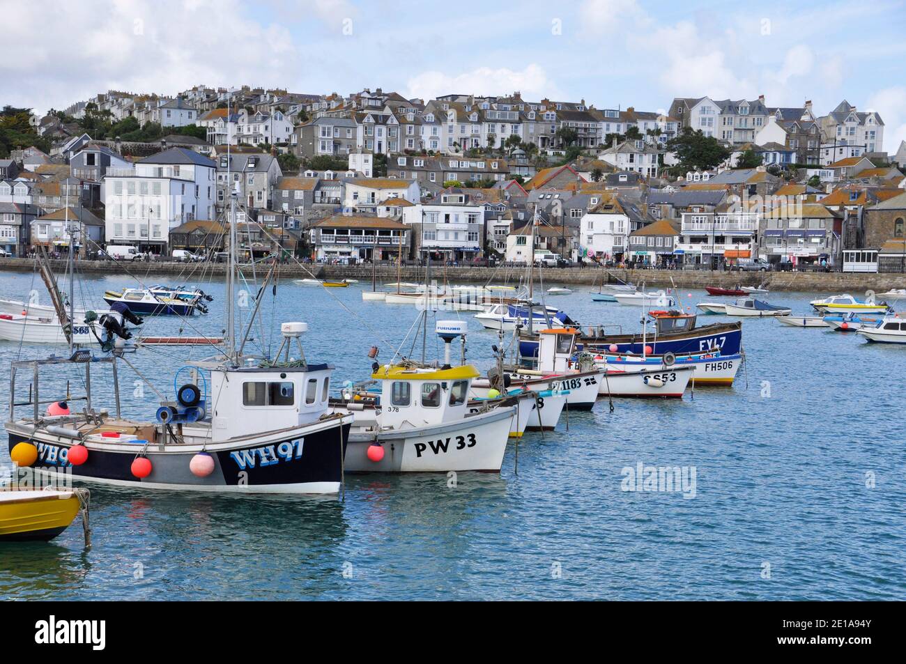 Fishing boats on a bright summers day in St Ives harbour,Cornwall.UK Stock Photo