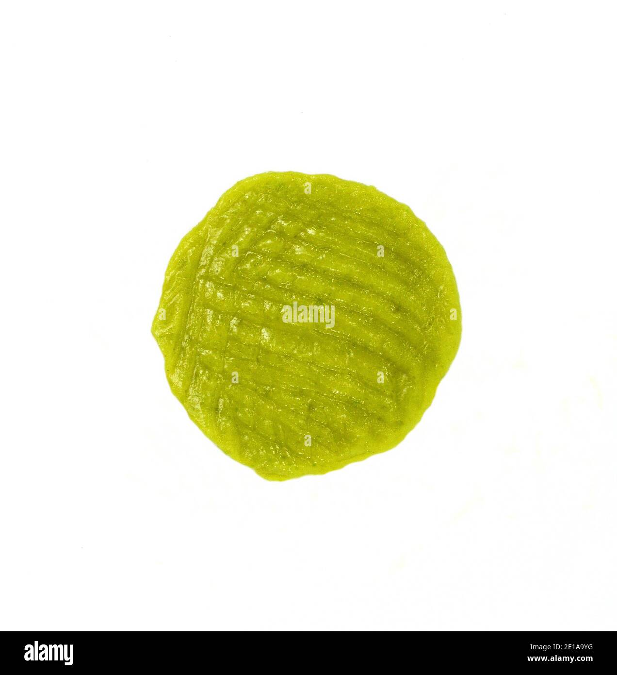 Puddle of green wasabi dressing or wasabi sauce spot isolated on white