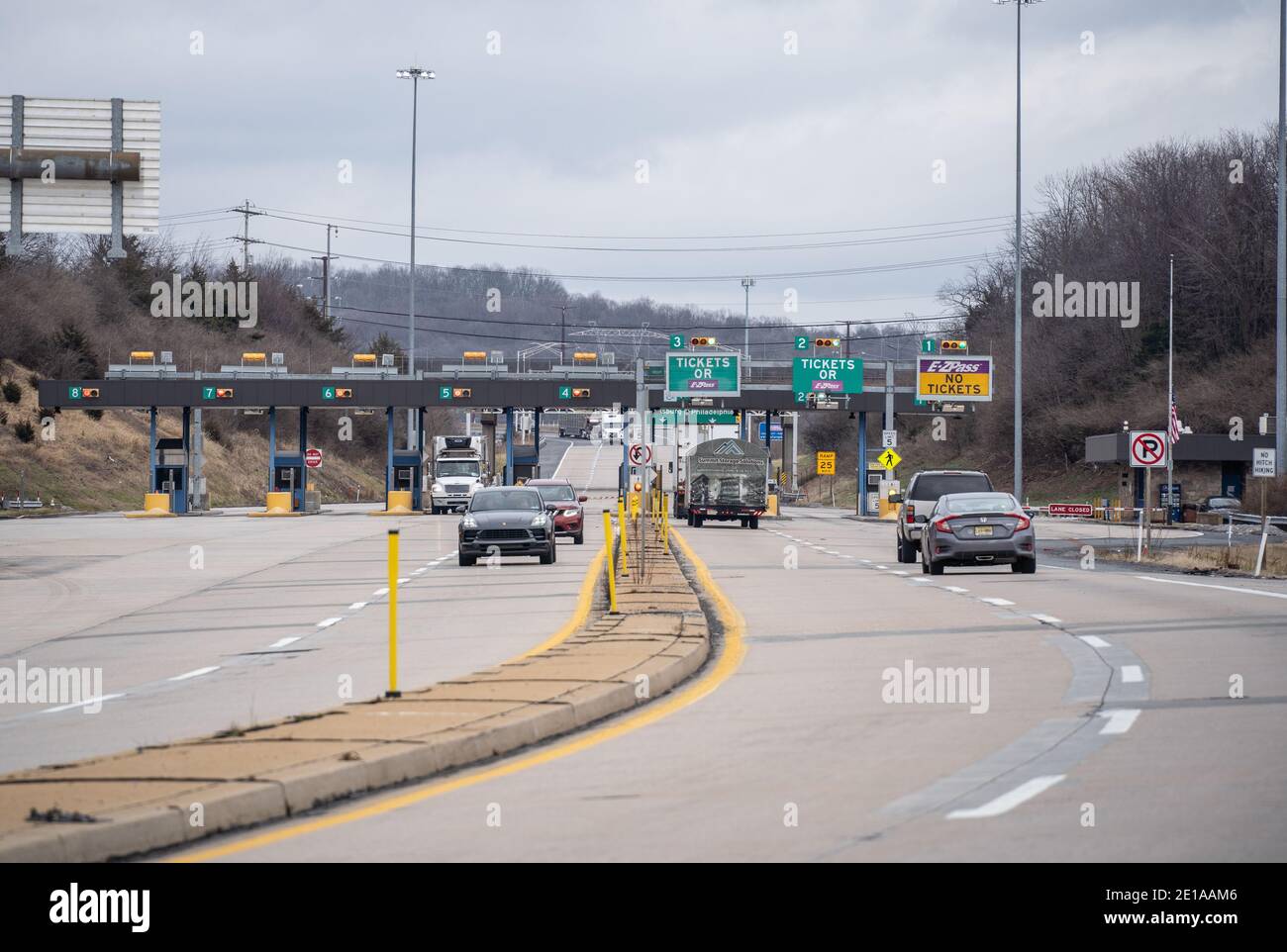 Denver,  Pennsylvania, USA- January, 4, 2021: Cars and trucks pass through Pennsylvania toll plaza which will now use a cashless system to collect tol Stock Photo