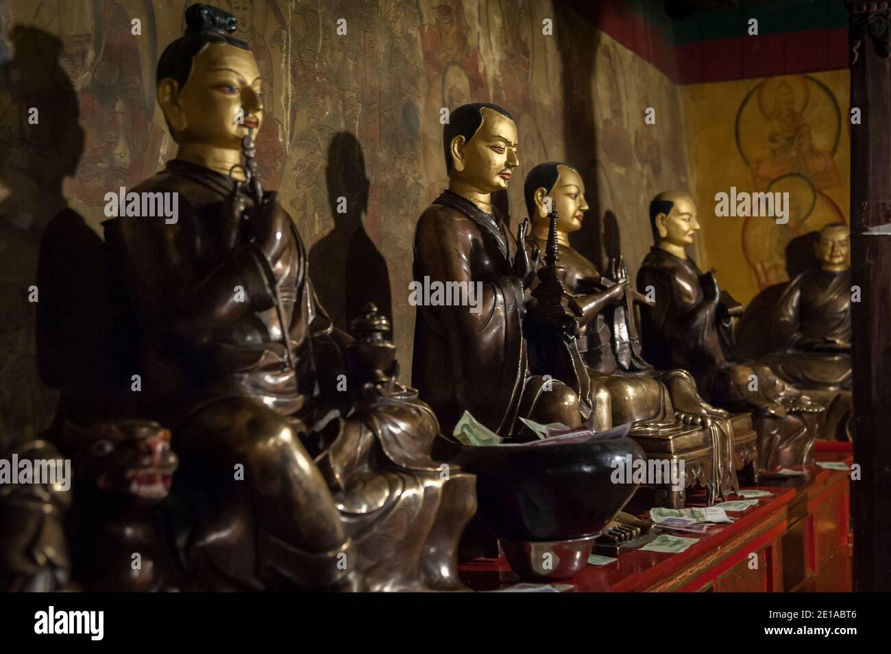 ZHANANG, TIBET CHINA - AUGUST, 16 2018:  Buddha statues in the Mindroling Monastery, Zhanang County, Shannan Prefecture, Tibet Autonomous Region, Chin Stock Photo