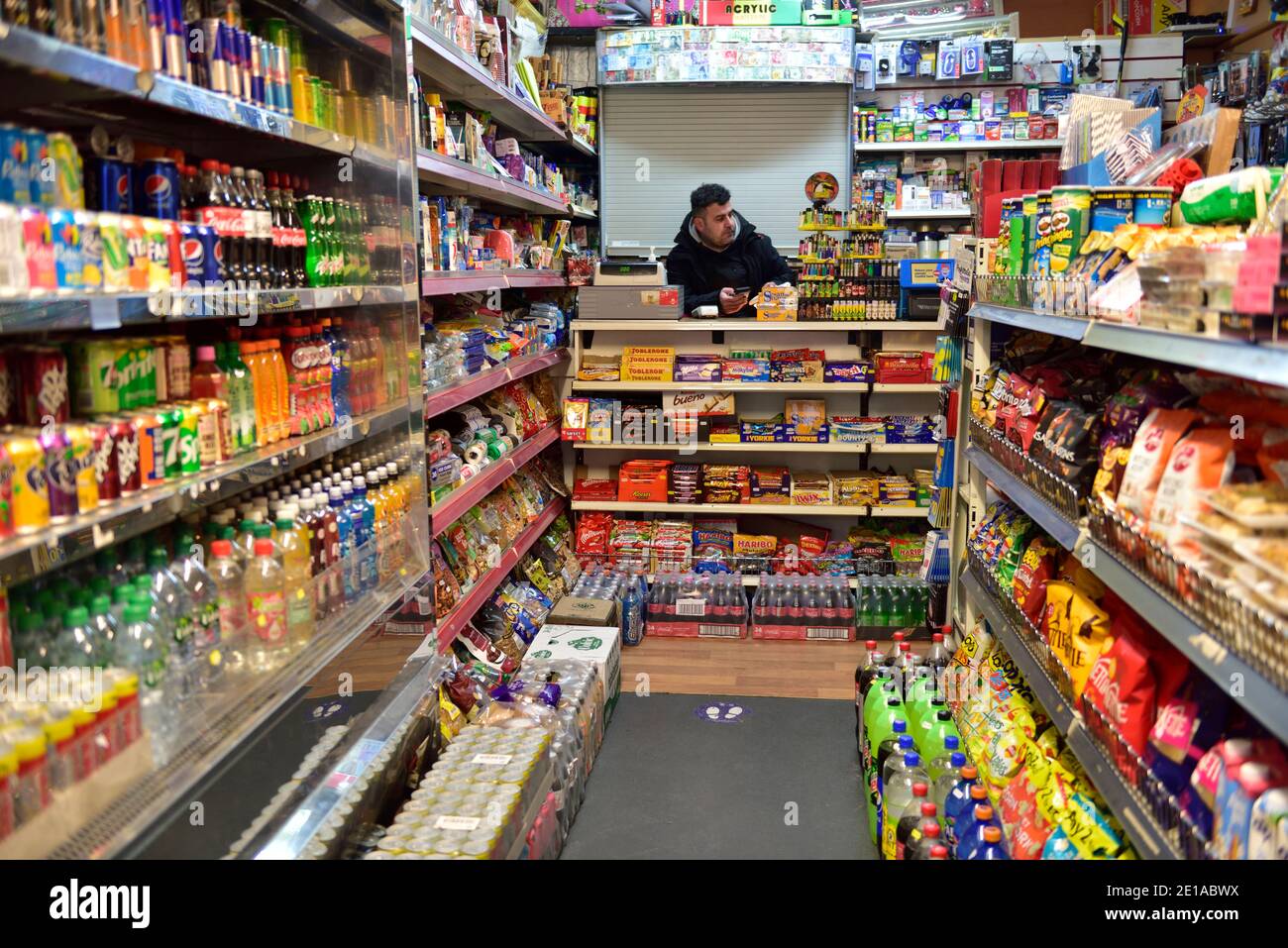 Interior of small local corner, metro, store with well stocked shelves