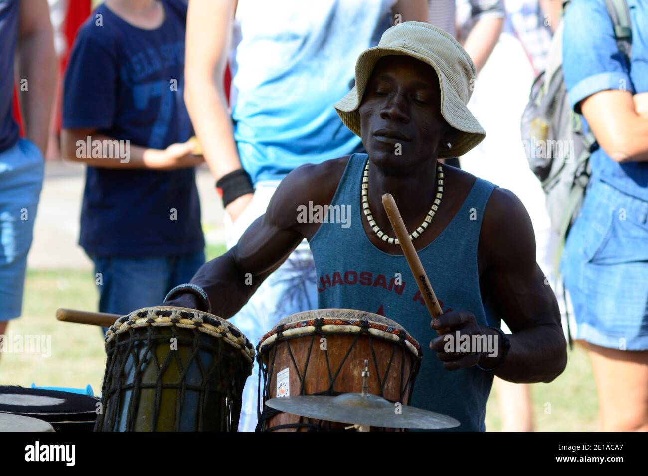Vienna, Austria. August 07, 2016. Impressions from the 2016 festival season on the Danube Island in Vienna. A man drums on the festival site. Stock Photo