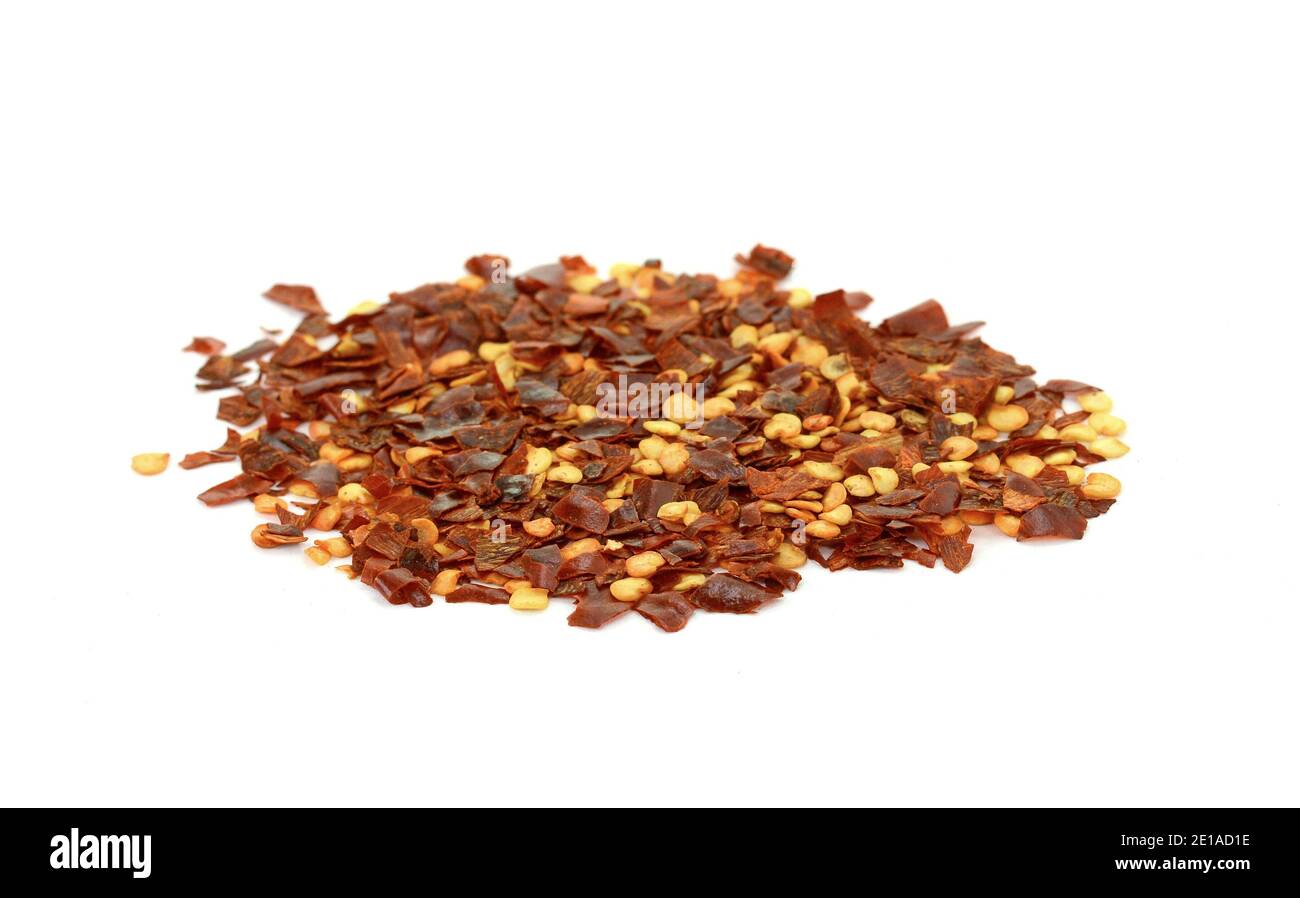 Cayenne pepper. Pile crushed red cayenne pepper, dried chili flakes and