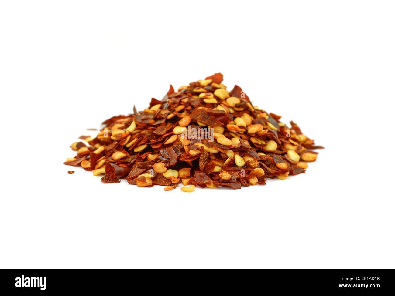 Cayenne pepper. Pile crushed red cayenne pepper, dried chili flakes and