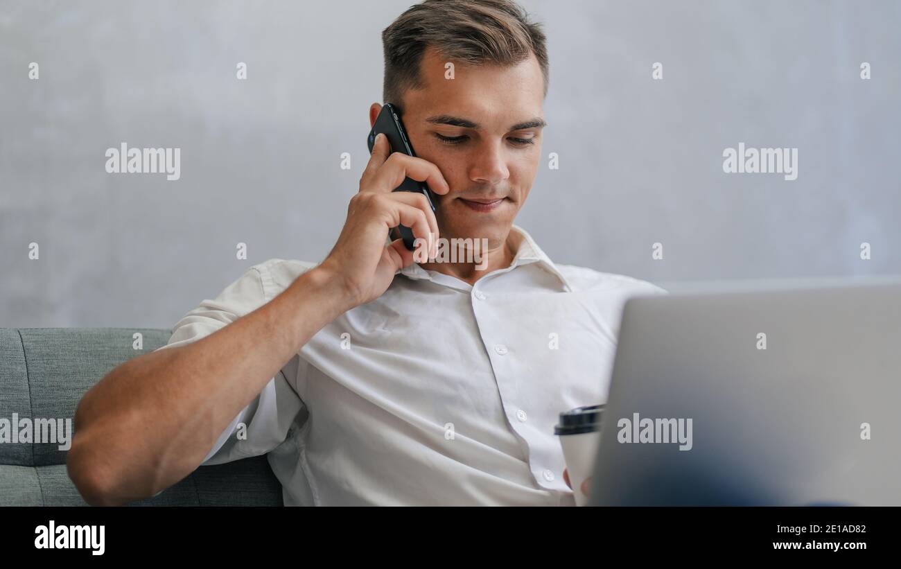 close up. young entrepreneur is talking on a smartphone. Stock Photo