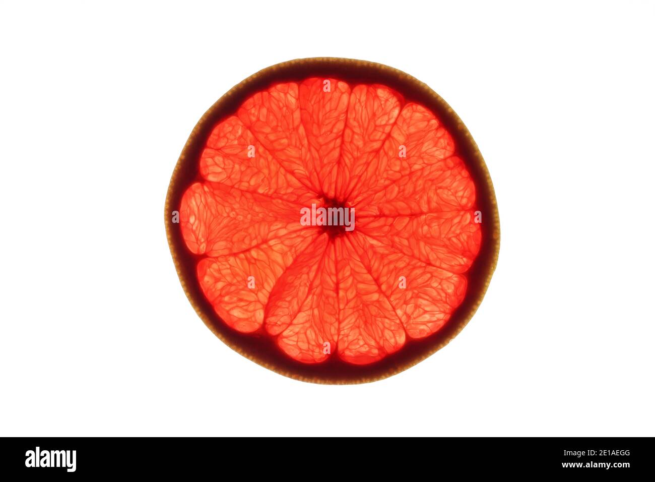 Slice of ripe ruby grapefruit on white background Stock Photo