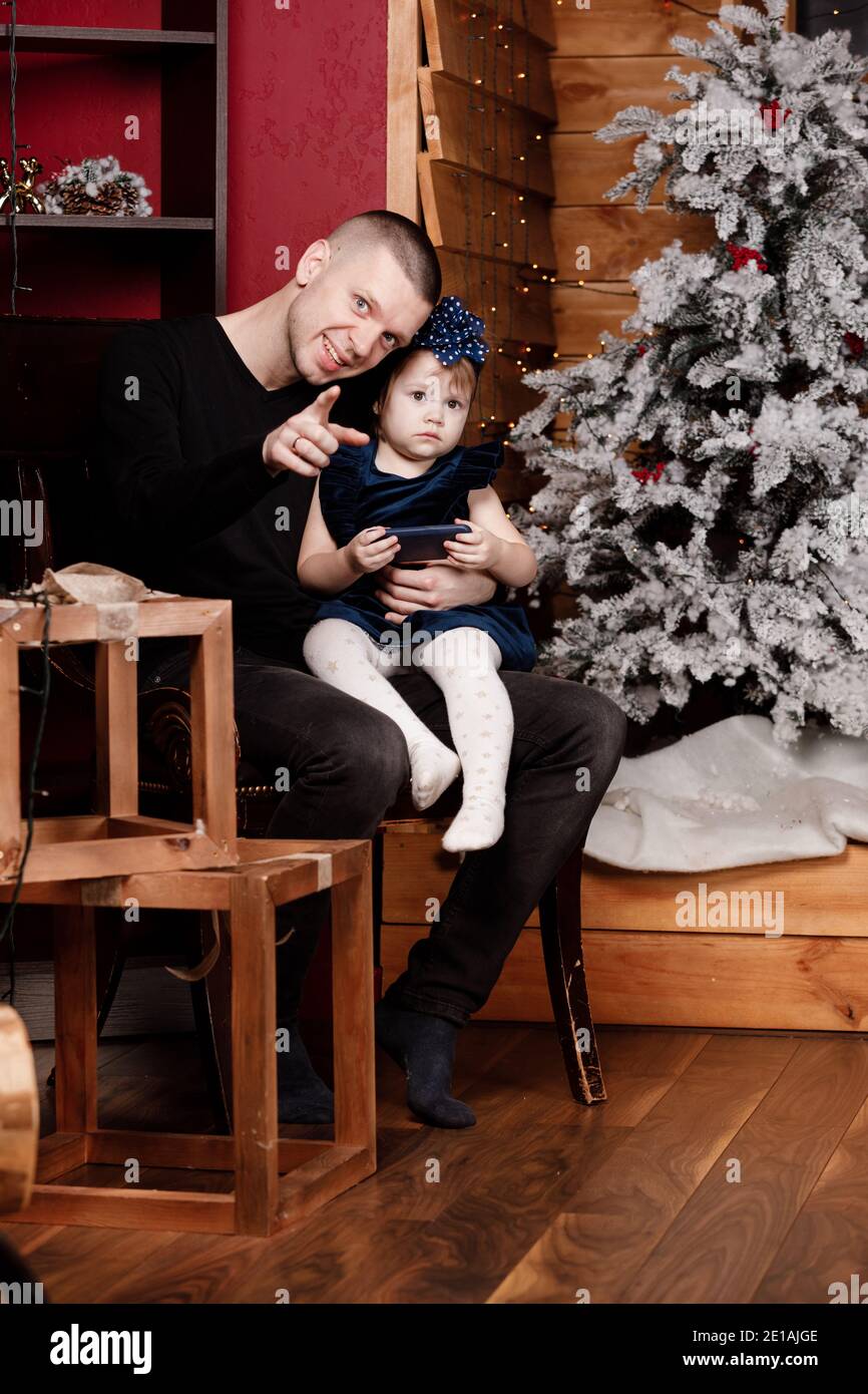 Sitting on dads lap hi-res stock photography and images - Alamy