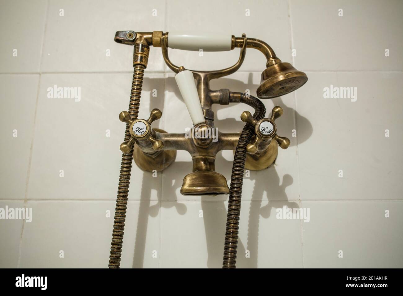Antique Copper style bath tube faucet. Selective focus Stock Photo