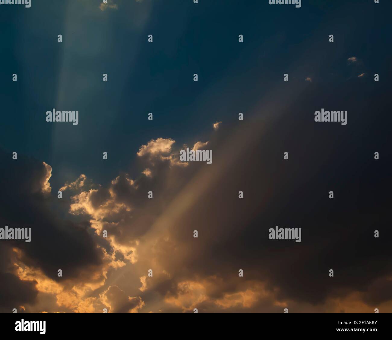 Dramatic sky with clouds and sun rays Stock Photo