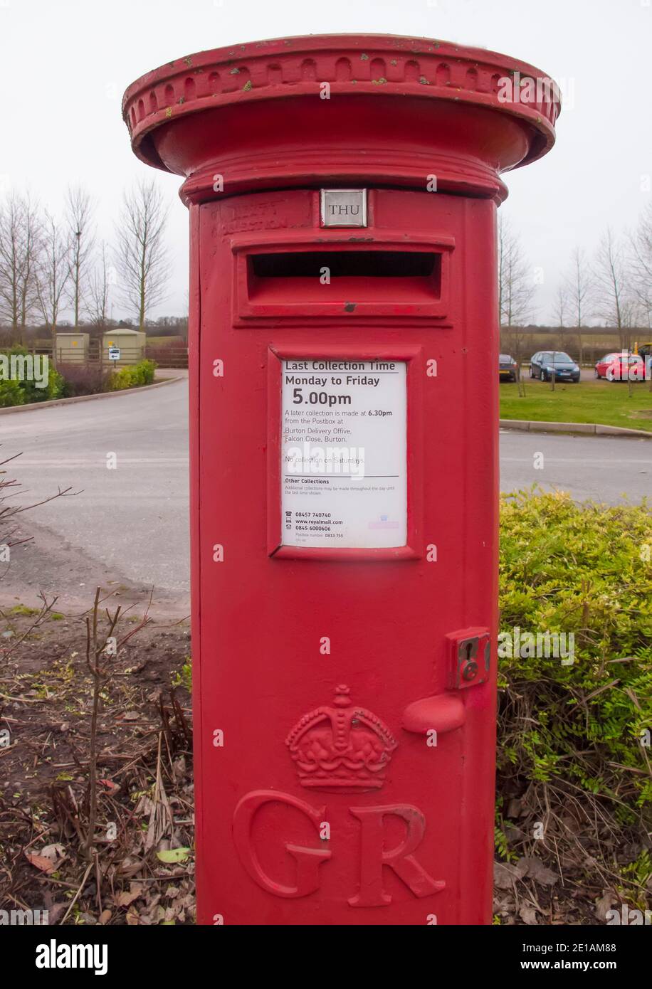 Traditional British red post box Stock Photo