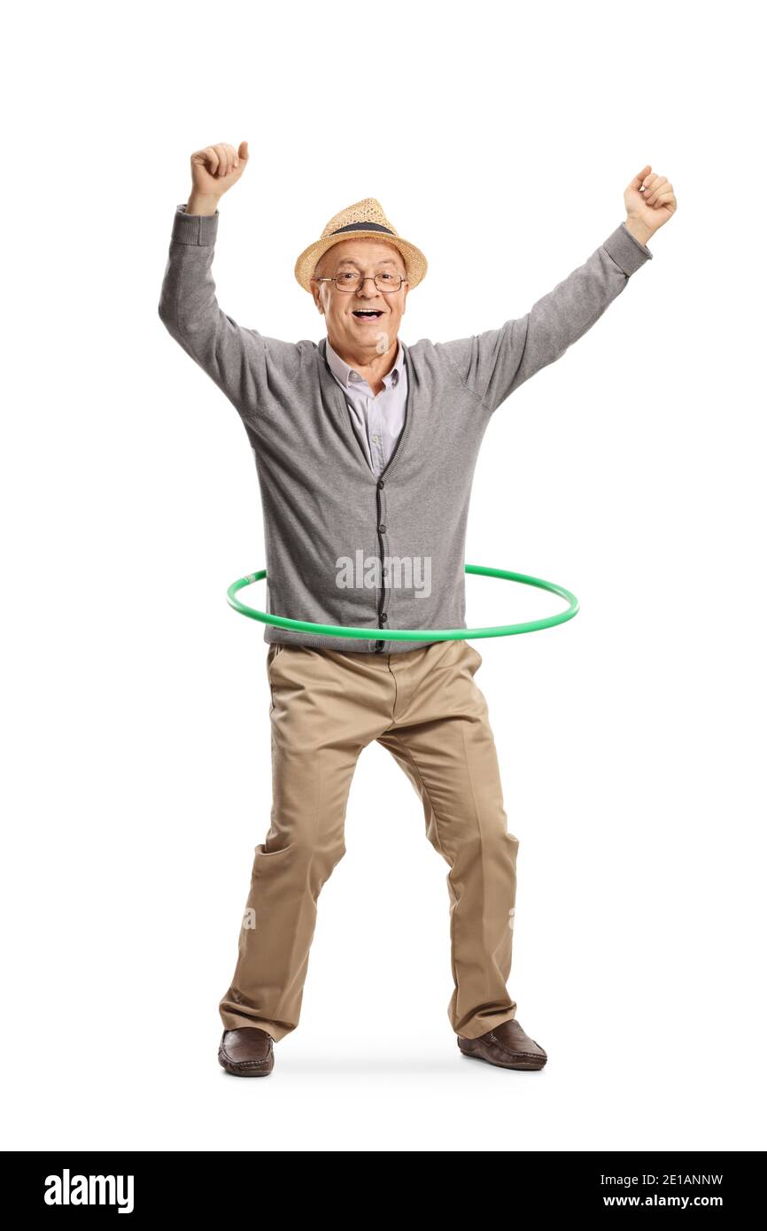 Full length portrait of an excited elderly man spinning a hula hoop isolated on white background Stock Photo