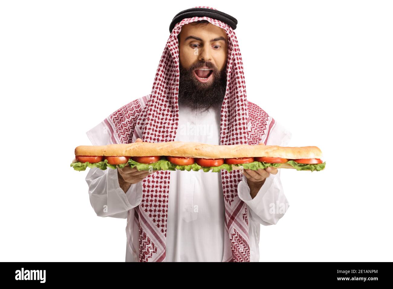Excited arab man holding a tasty long sandwich in a baguette isolated on white background Stock Photo