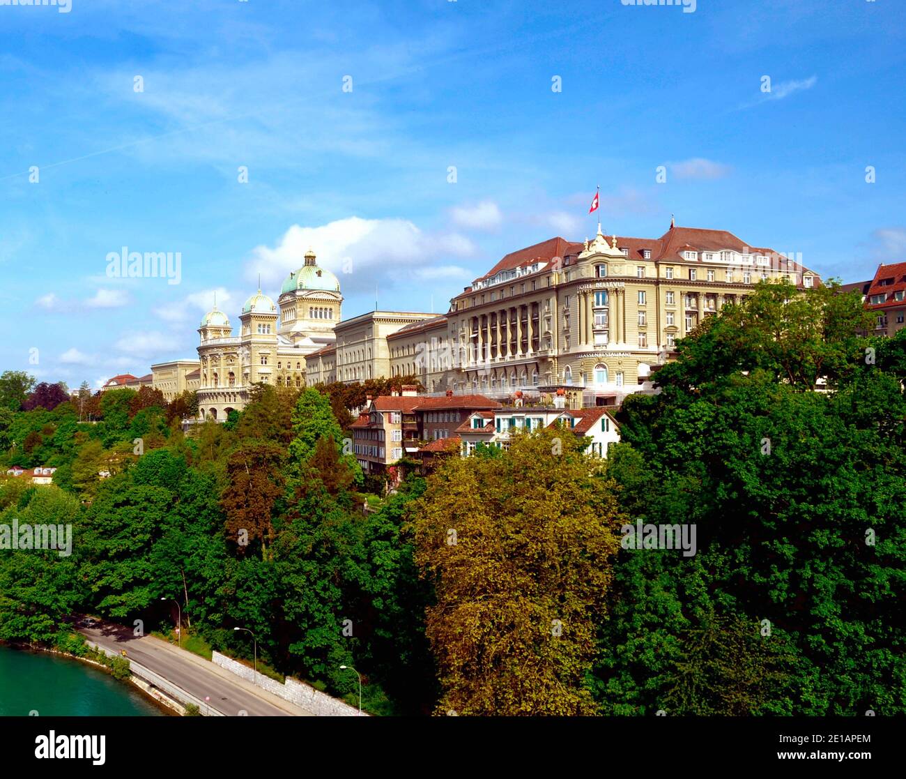 View of Swiss Parliament and Adjacent  Buildings from a Bridge over Aare River in Bern Stock Photo