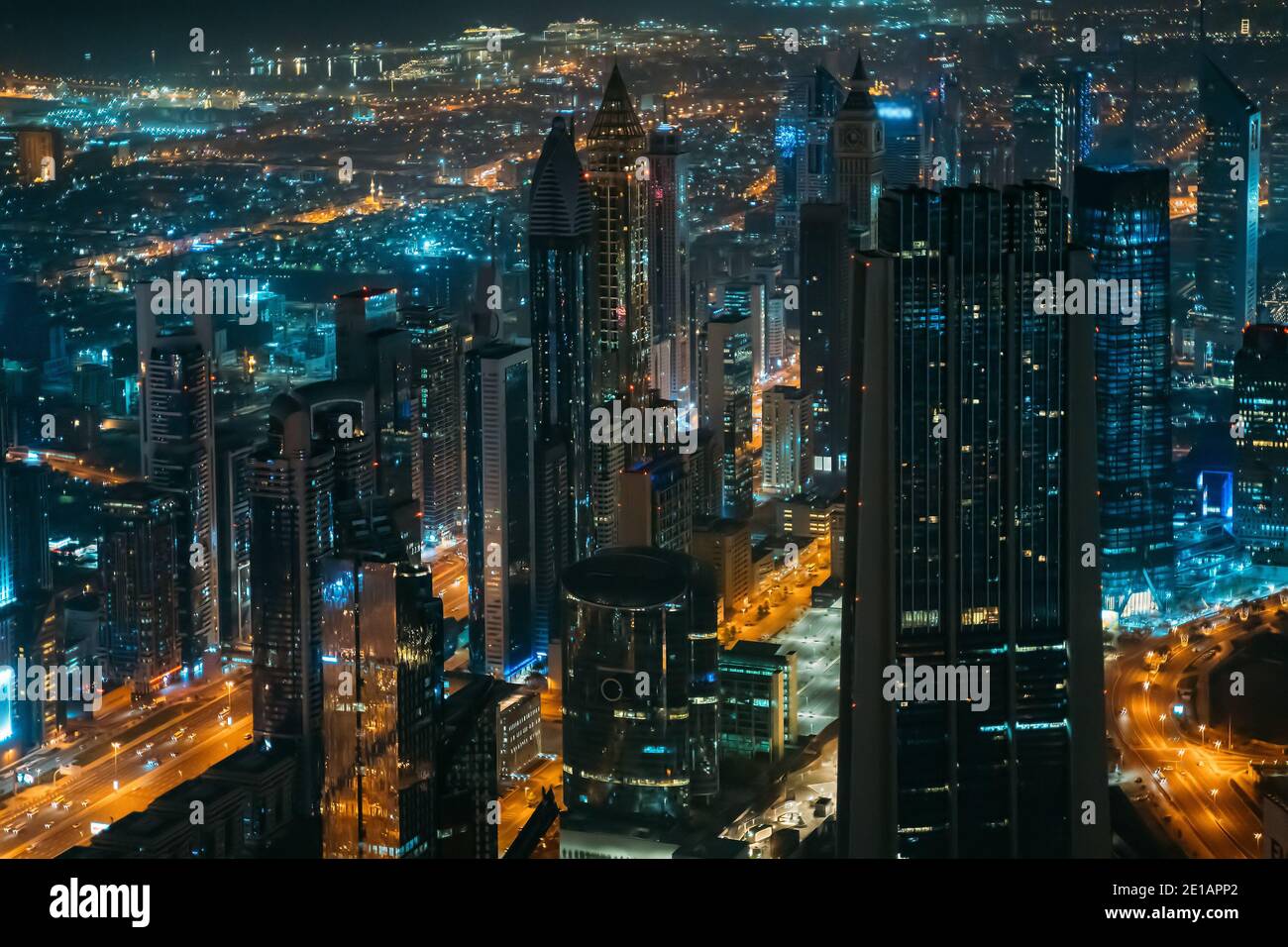 Amazing night Dubai city downtown skyline with modern illuminated buildings, Dubai, UAE. Stock Photo